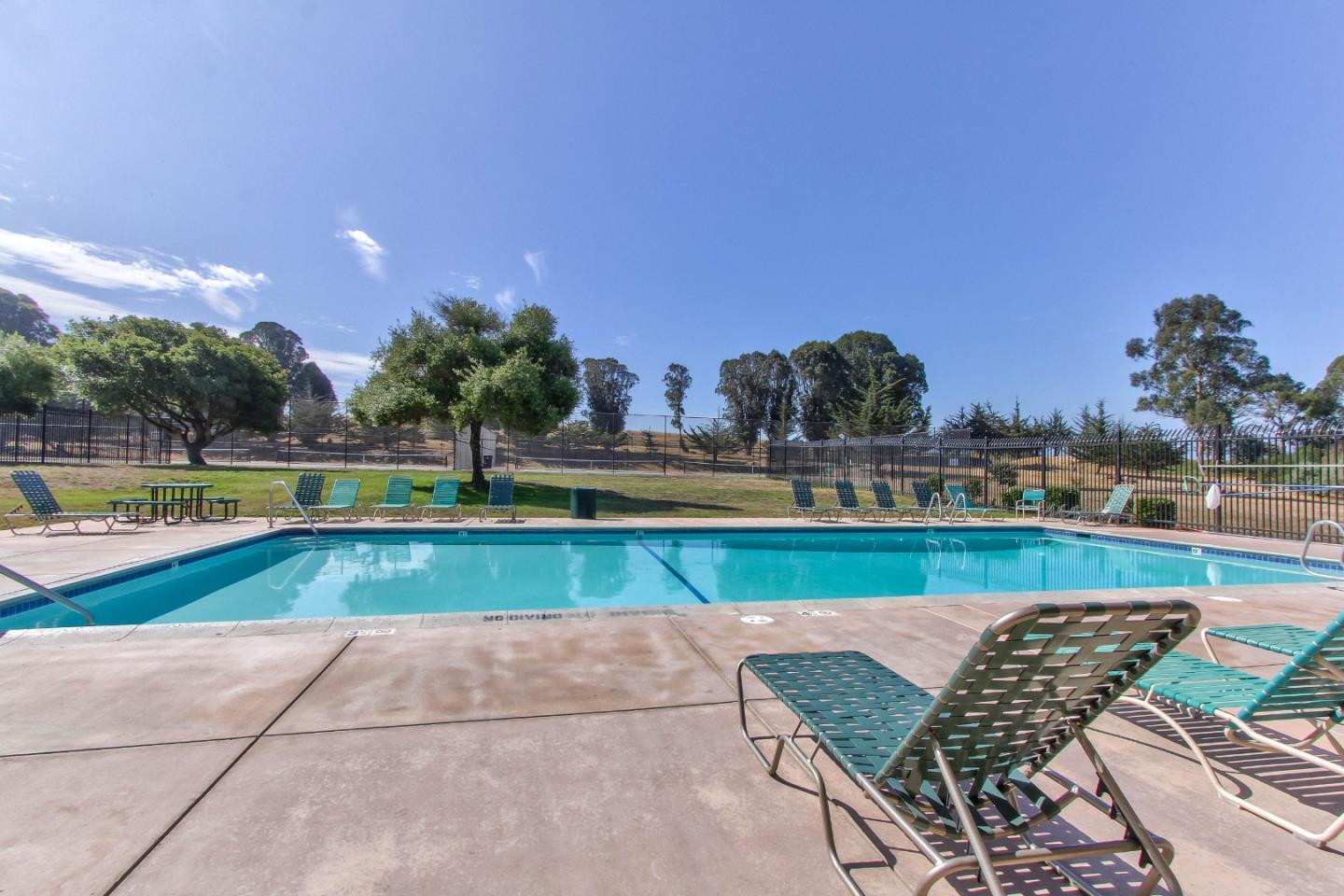 9919 Mimosa Path Salinas, CA 93907 - Photo 36 of 39 a view of swimming pool with seating space and outdoor seating