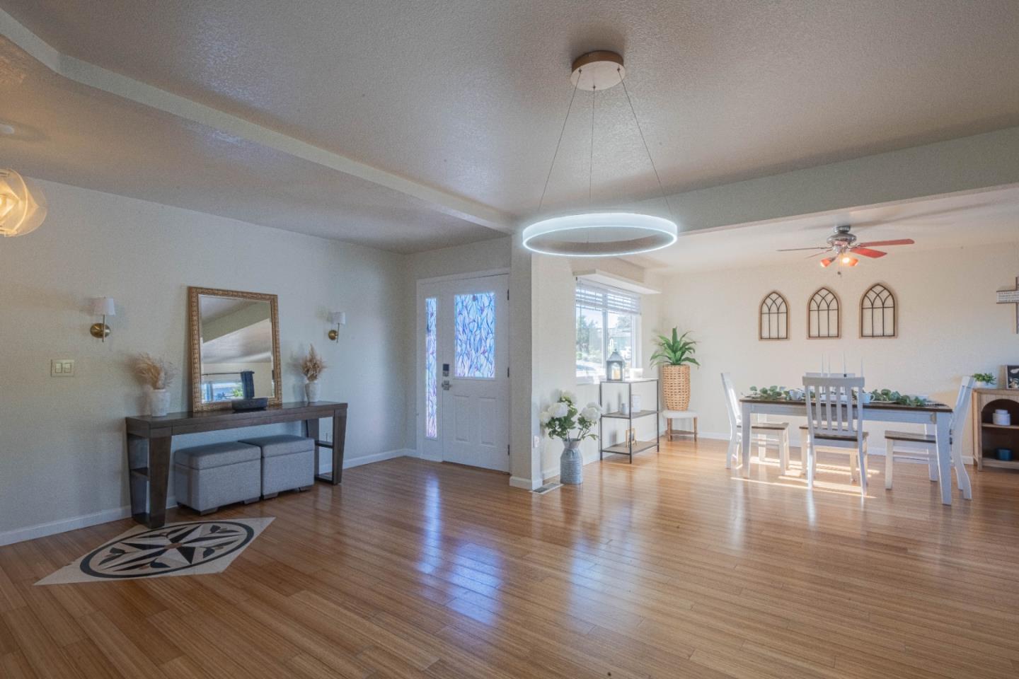 9919 Mimosa Path Salinas, CA 93907 - Photo 5 of 39 a living room with furniture and wooden floor
