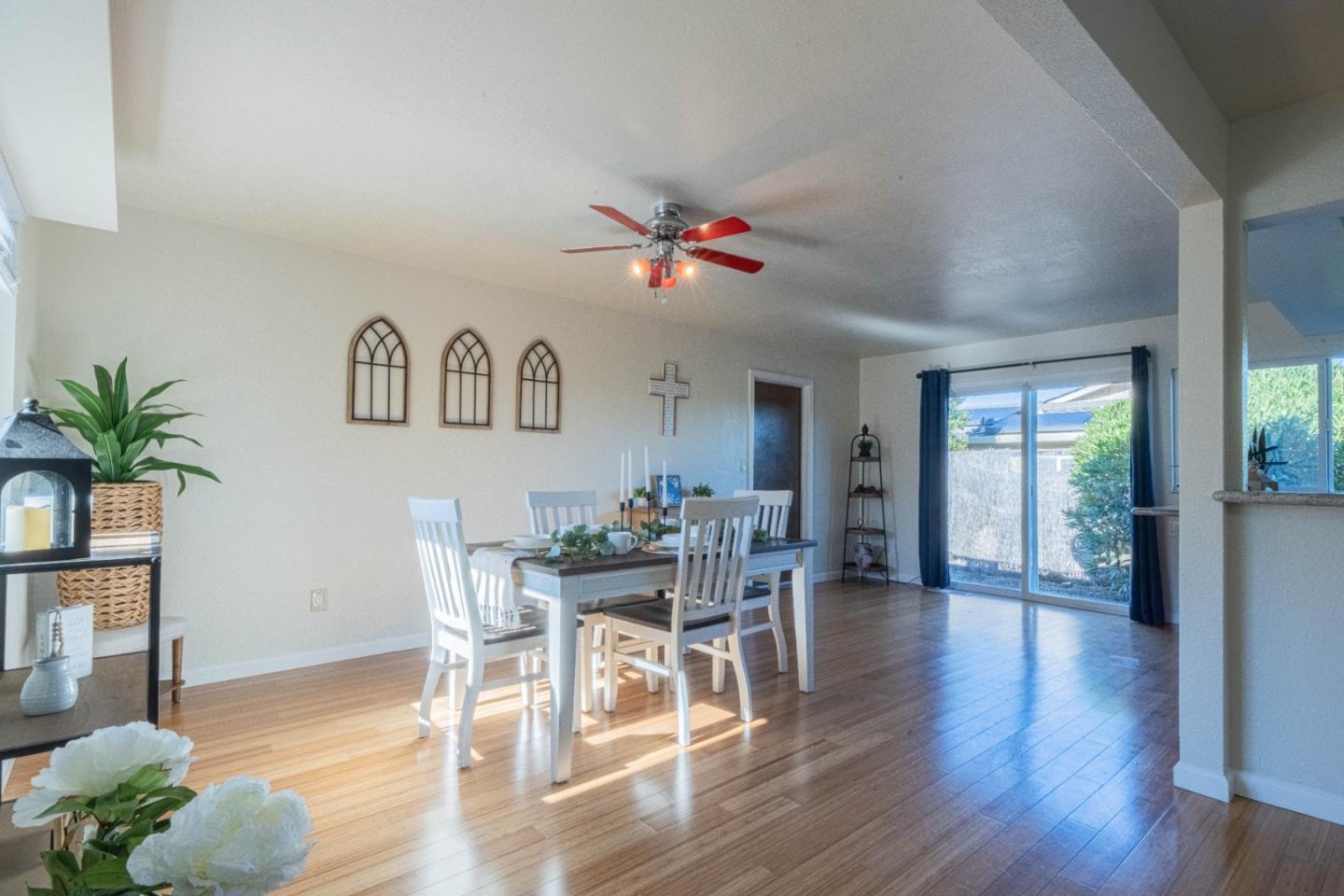 9919 Mimosa Path Salinas, CA 93907 - Photo 6 of 39 a view of a dining room with furniture window and wooden floor