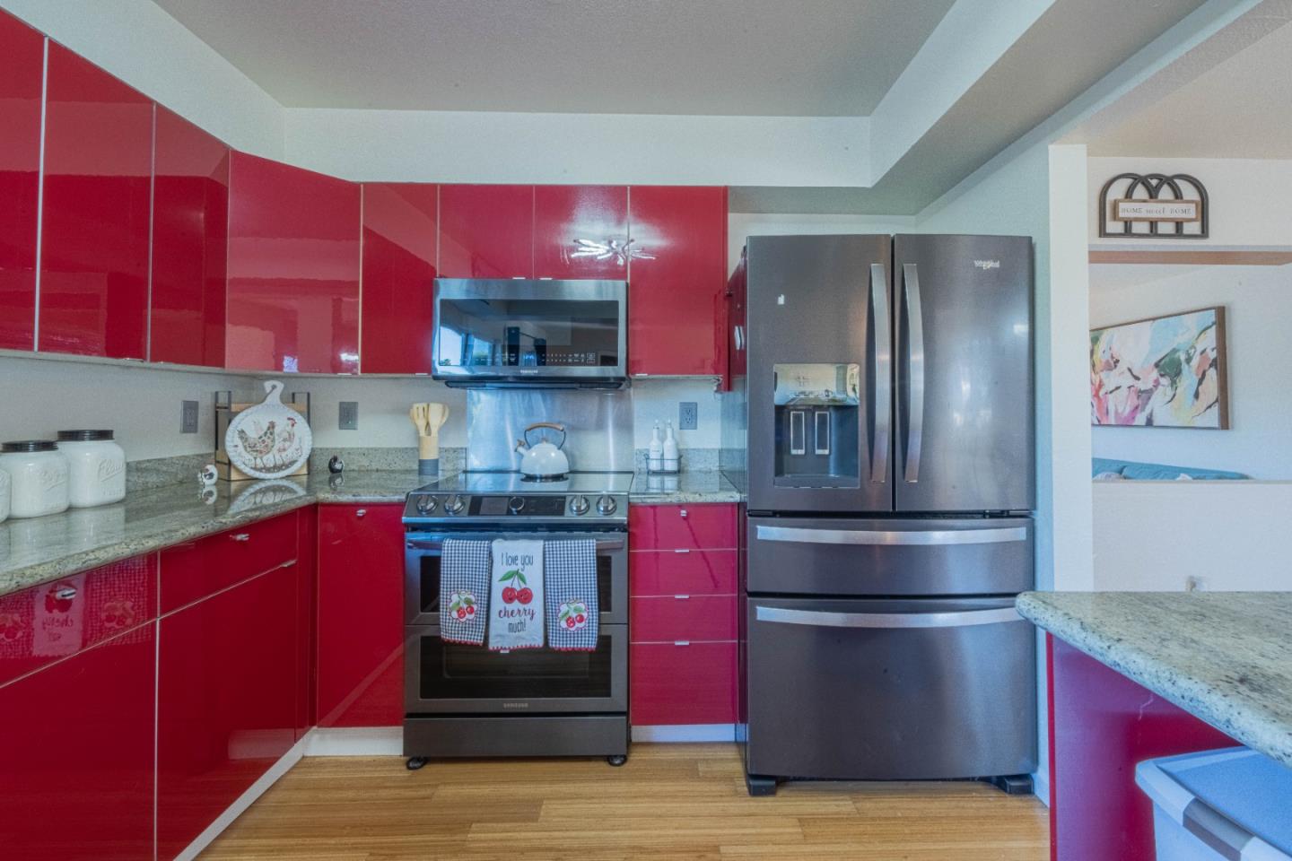 9919 Mimosa Path Salinas, CA 93907 - Photo 9 of 39 a kitchen with stainless steel appliances granite countertop a refrigerator and a stove