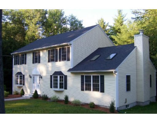 752 Mason Road Holden, MA 01522 - Photo 2 of 14 a front view of a house with a yard