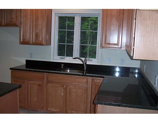 752 Mason Road Holden, MA 01522 - Photo 4 of 14 a kitchen with a sink a window and cabinets