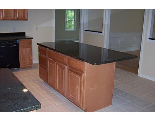 752 Mason Road Holden, MA 01522 - Photo 5 of 14 a kitchen with stainless steel appliances granite countertop a refrigerator and a stove