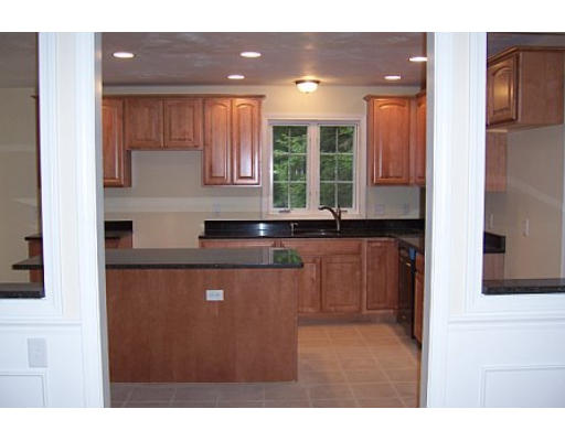 752 Mason Road Holden, MA 01522 - Photo 9 of 14 a kitchen with a sink cabinets and window