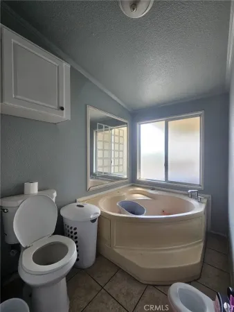 a bathroom with a double vanity sink and mirror