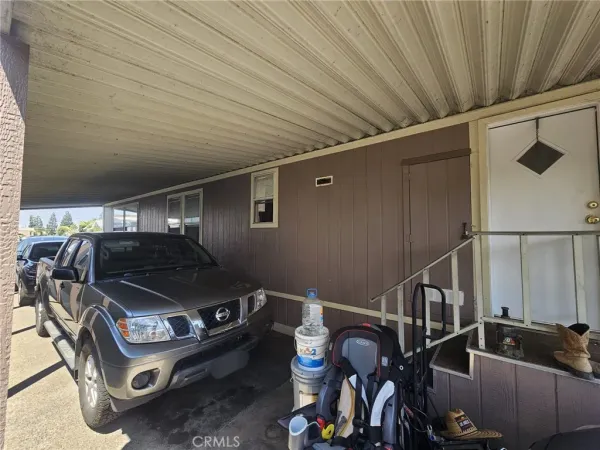 a utility room with cabinets washer and dryer