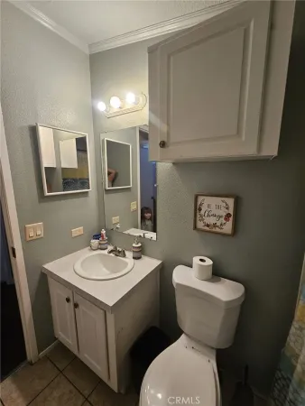 a bathroom with a toilet and a tub