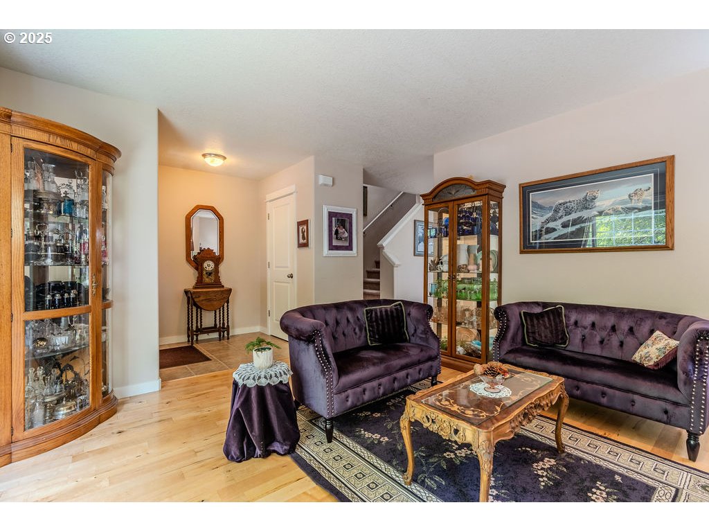 37702 Hamilton Ridge Drive Sandy, OR 97055 - Photo 11 of 44 a living room with furniture and a rug