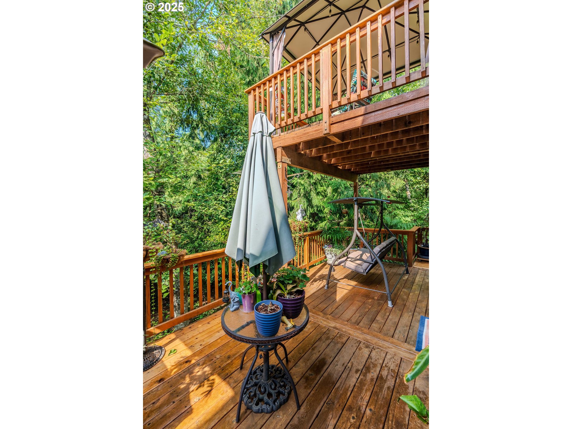 37702 Hamilton Ridge Drive Sandy, OR 97055 - Photo 21 of 44 a view of a living room with a table and chairs