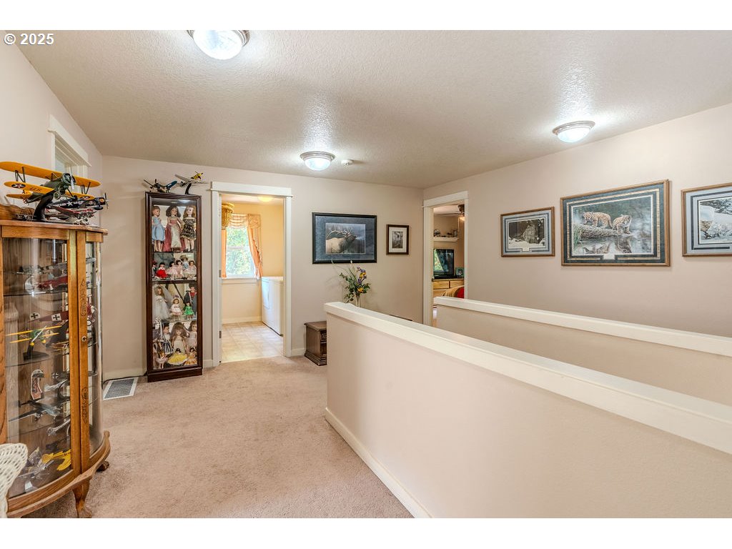 37702 Hamilton Ridge Drive Sandy, OR 97055 - Photo 23 of 44 a view of a livingroom with furniture and garage