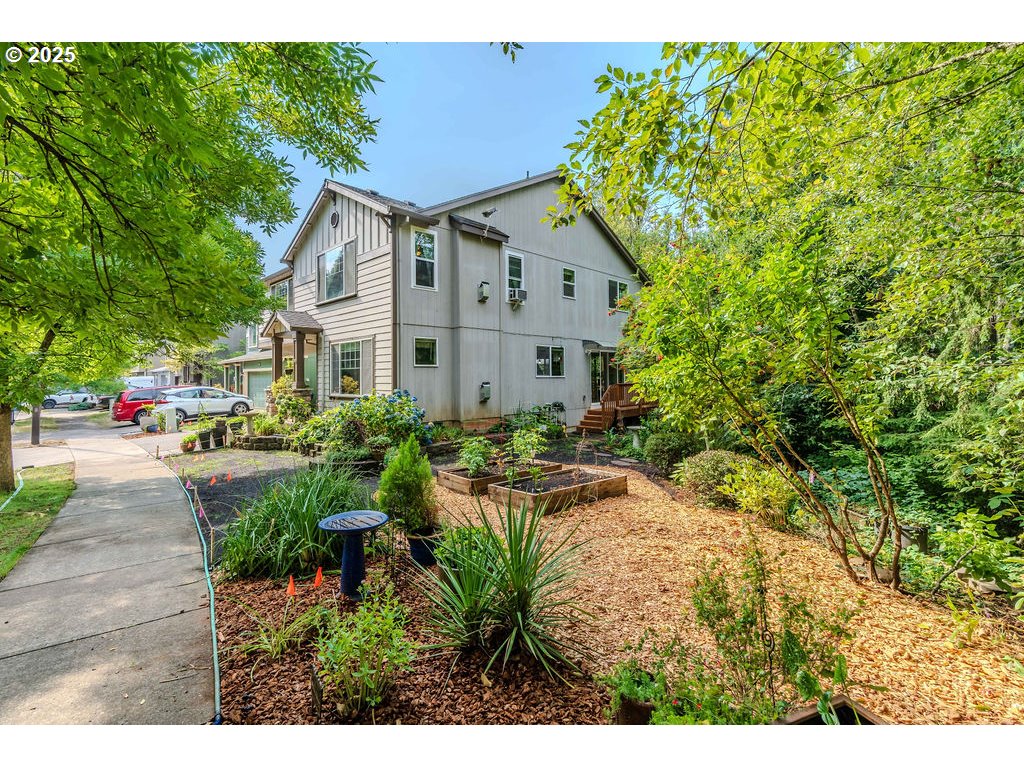 37702 Hamilton Ridge Drive Sandy, OR 97055 - Photo 3 of 44 a house view with a garden space