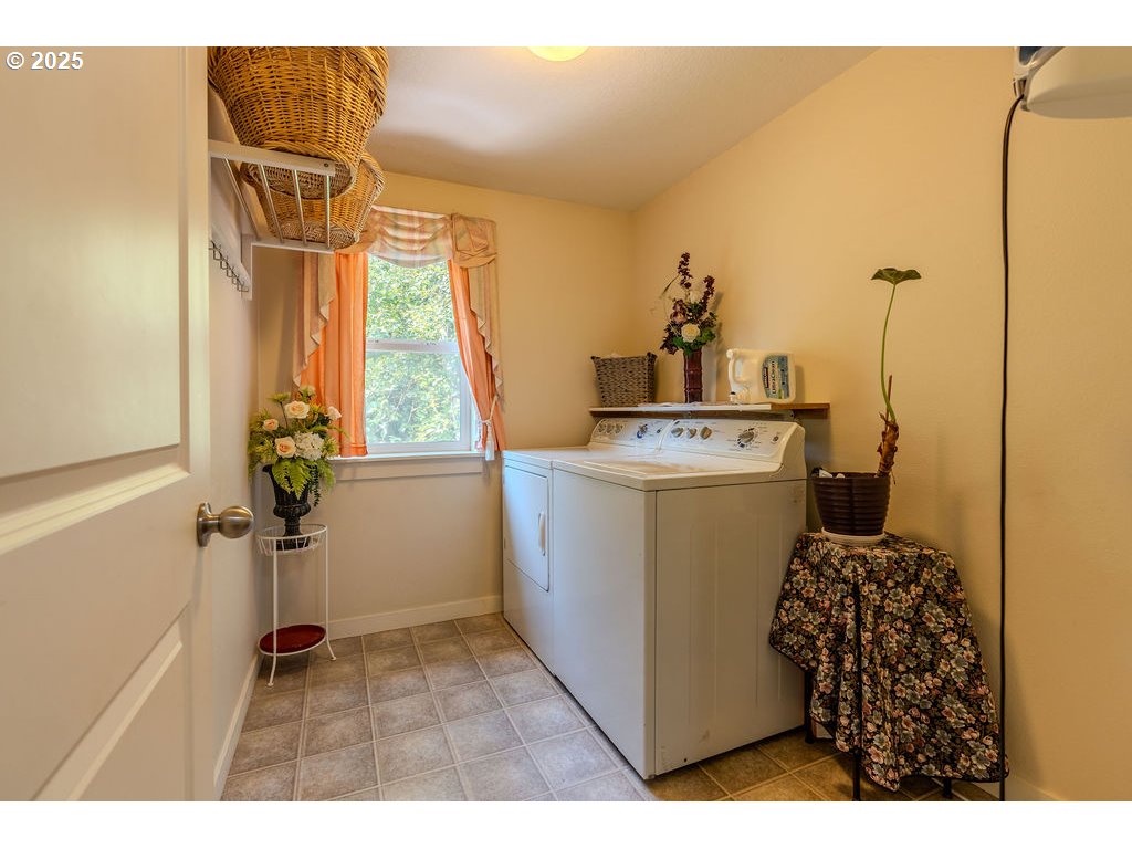 37702 Hamilton Ridge Drive Sandy, OR 97055 - Photo 37 of 44 a utility room with dryer and washer