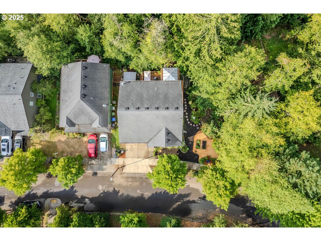 37702 Hamilton Ridge Drive Sandy, OR 97055 - Photo 4 of 44 an aerial view of a house with a yard basket ball court and outdoor seating