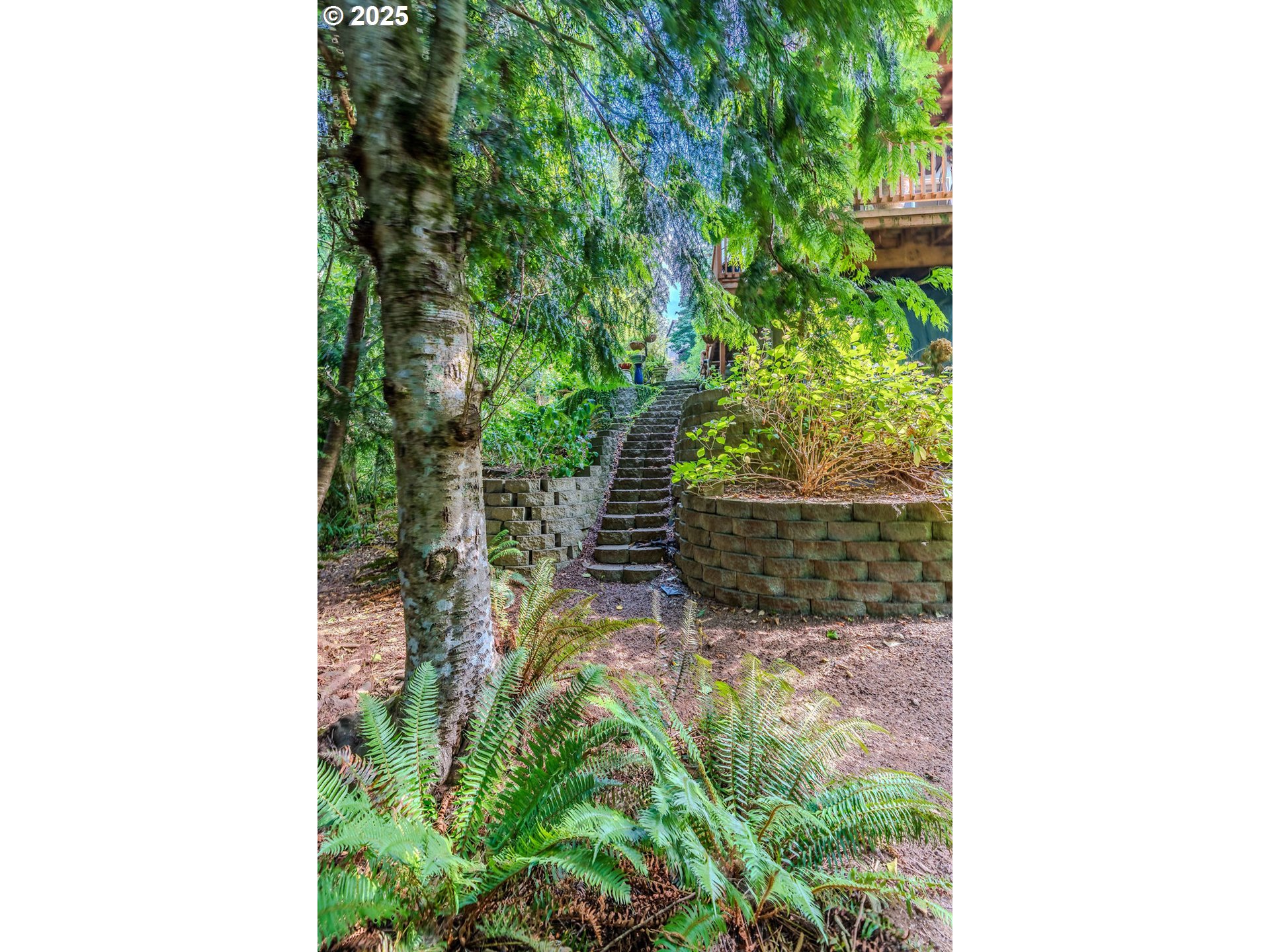 37702 Hamilton Ridge Drive Sandy, OR 97055 - Photo 41 of 44 a backyard of a house with lots of green space