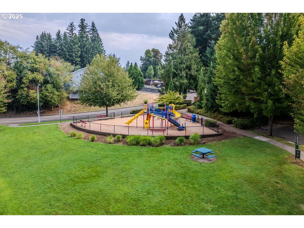 37702 Hamilton Ridge Drive Sandy, OR 97055 - Photo 44 of 44 a childrens park with lots of swings slides and swimming pool in the back
