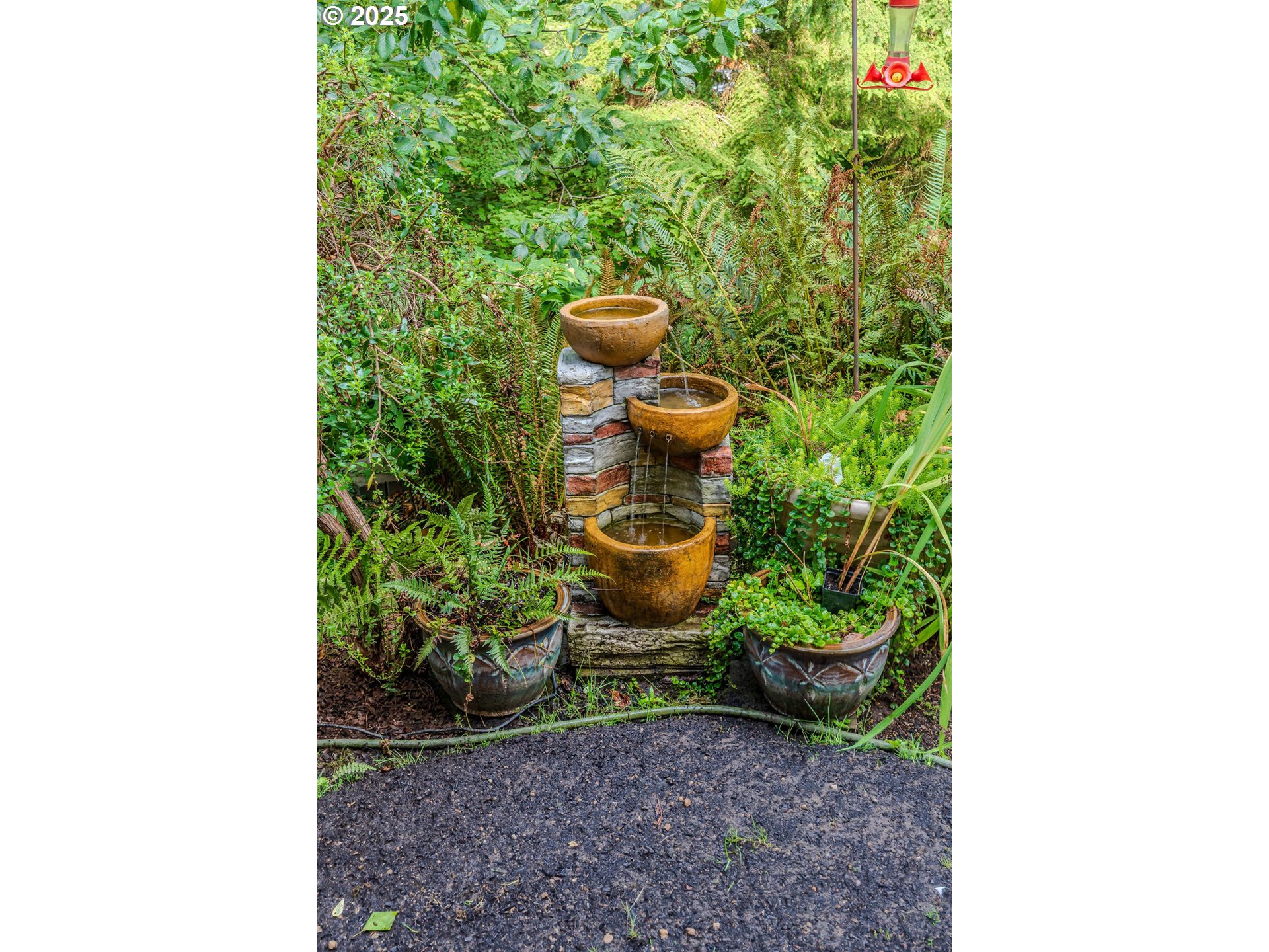 37702 Hamilton Ridge Drive Sandy, OR 97055 - Photo 7 of 44 a picture of a bench in a garden