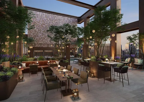 a view of a tables and chairs in a patio