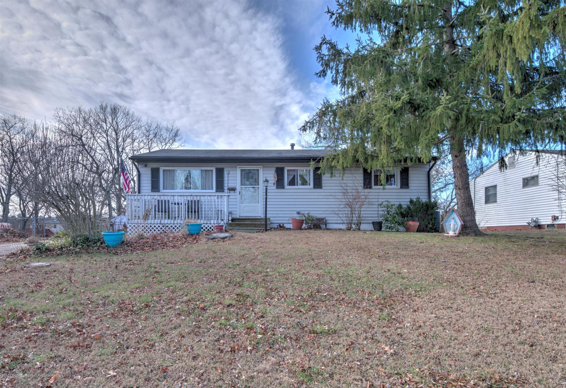 60 Mallard Road Bayville, NJ 08721 - Photo 1 of 20 a view of a house with a yard and large tree
