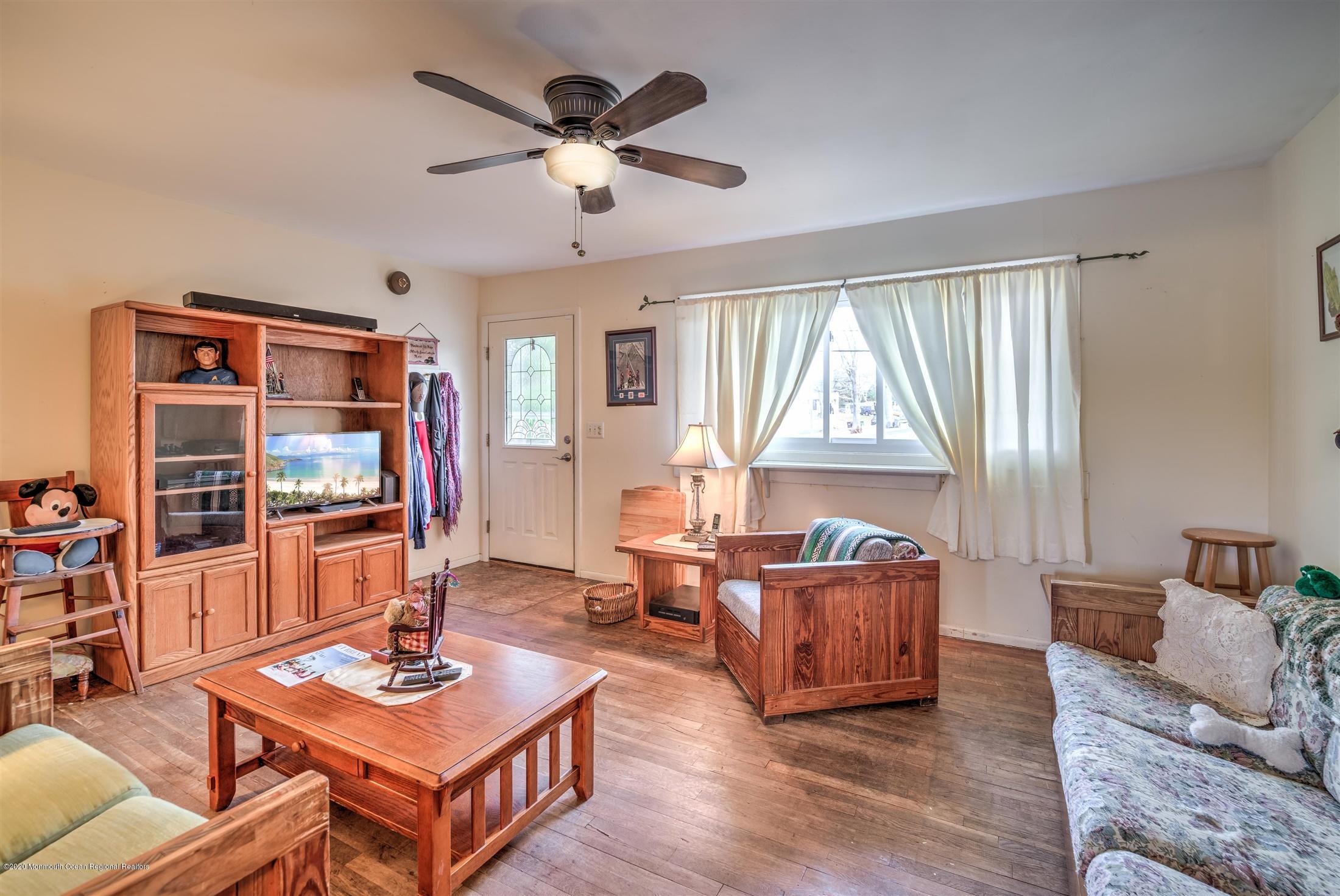 60 Mallard Road Bayville, NJ 08721 - Photo 2 of 20 a living room with furniture and a flat screen tv