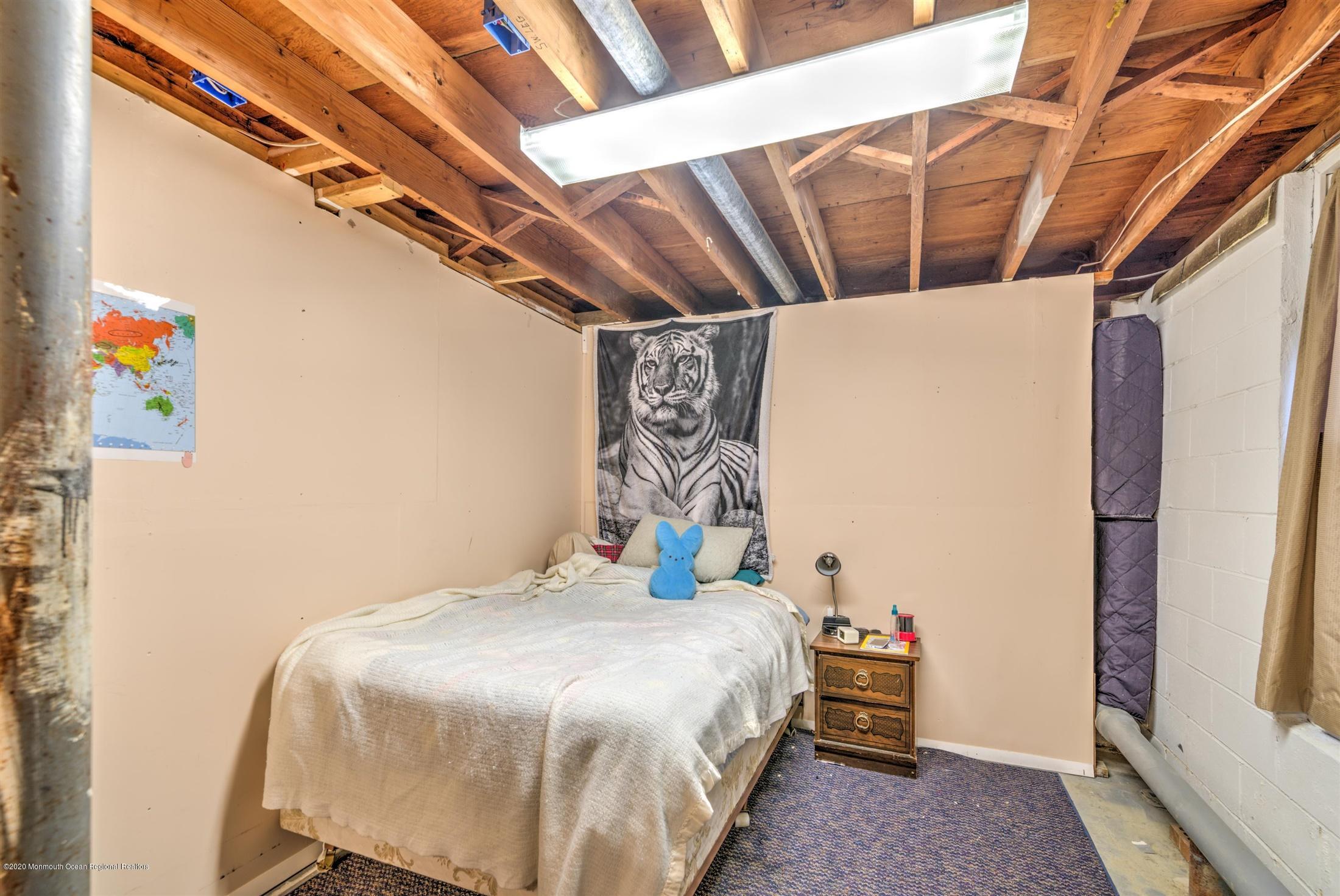 60 Mallard Road Bayville, NJ 08721 - Photo 14 of 20 a bedroom with a bed and a window