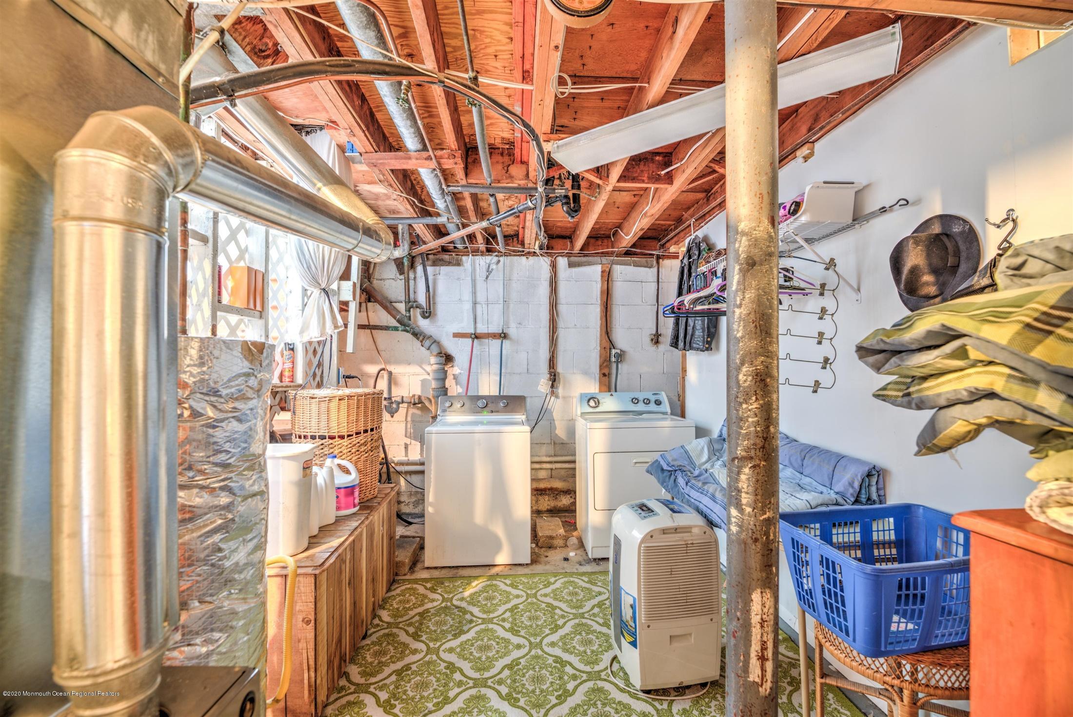 60 Mallard Road Bayville, NJ 08721 - Photo 16 of 20 a utility room with multiple dryer and washer