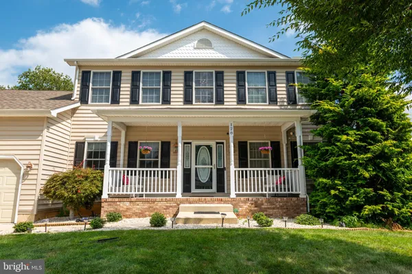 a view of a house with a porch