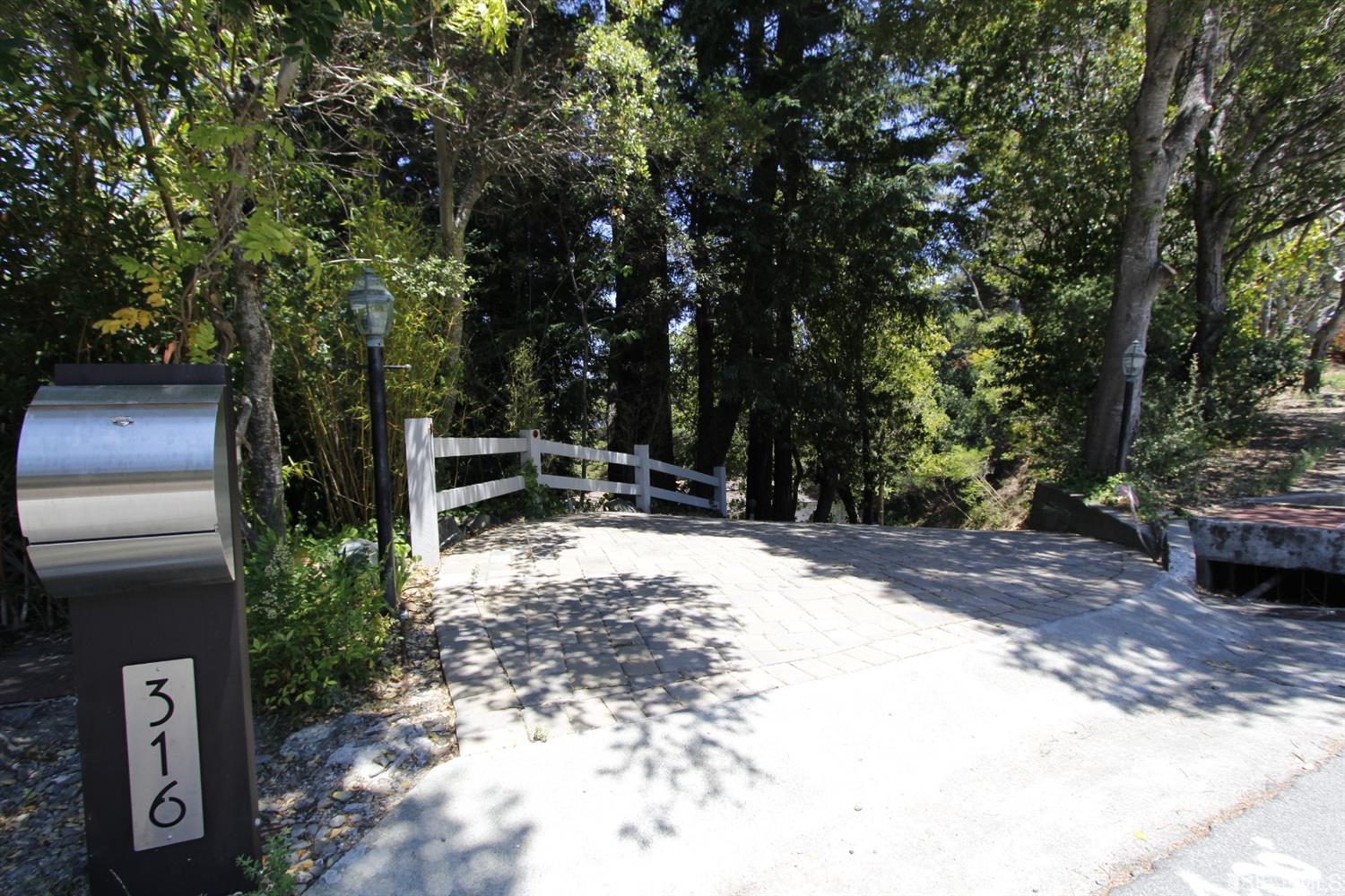 316 Alberta Way Hillsborough, CA 94010 - Photo 2 of 31 a view of outdoor space with deck and tree