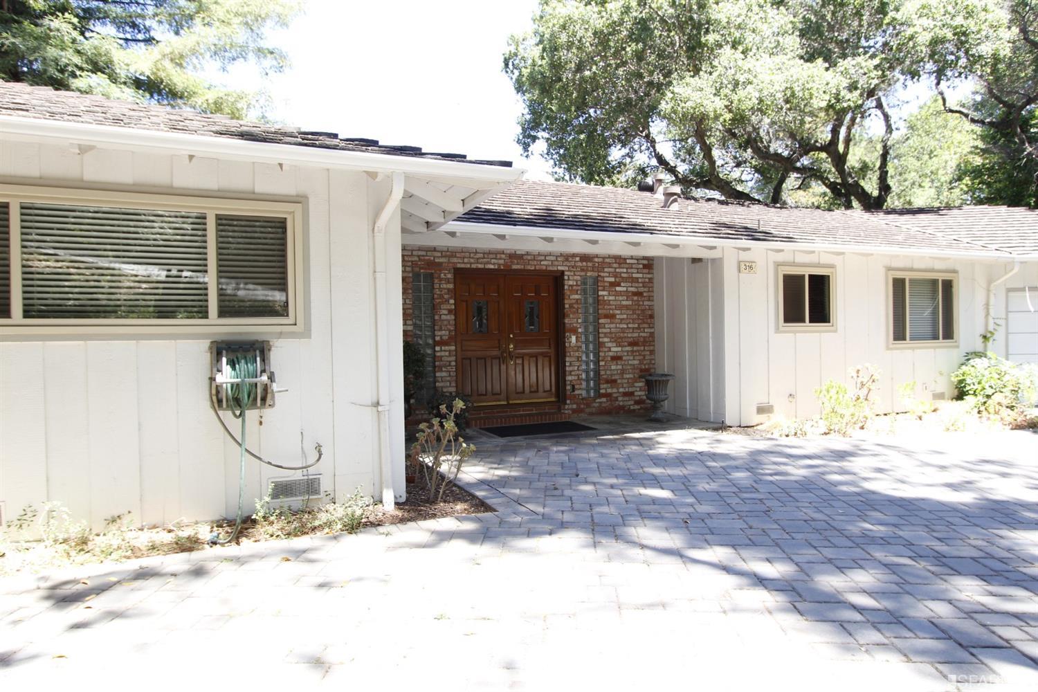 316 Alberta Way Hillsborough, CA 94010 - Photo 5 of 31 a front view of a house