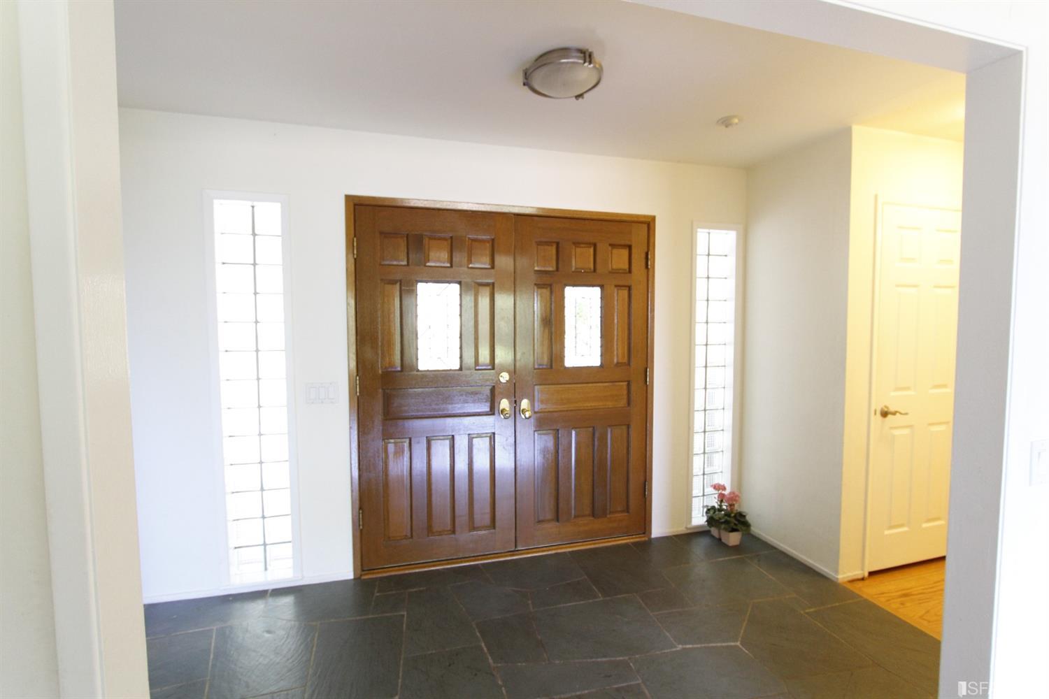 316 Alberta Way Hillsborough, CA 94010 - Photo 6 of 31 a view of an entryway with wooden floor