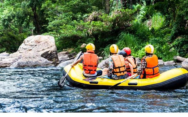 a view of a swimming pool with sitting area
