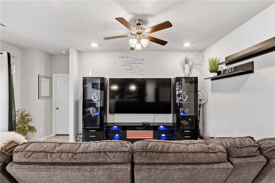 2009 Chief Street Bryan, TX 77807 - Photo 4 of 27 a living room with furniture and a flat screen tv