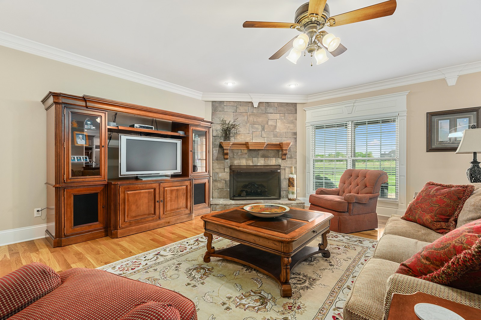 288 Lee Road Cottontown, TN 37048 - Photo 16 of 47 a living room with furniture a flat screen tv and a fireplace