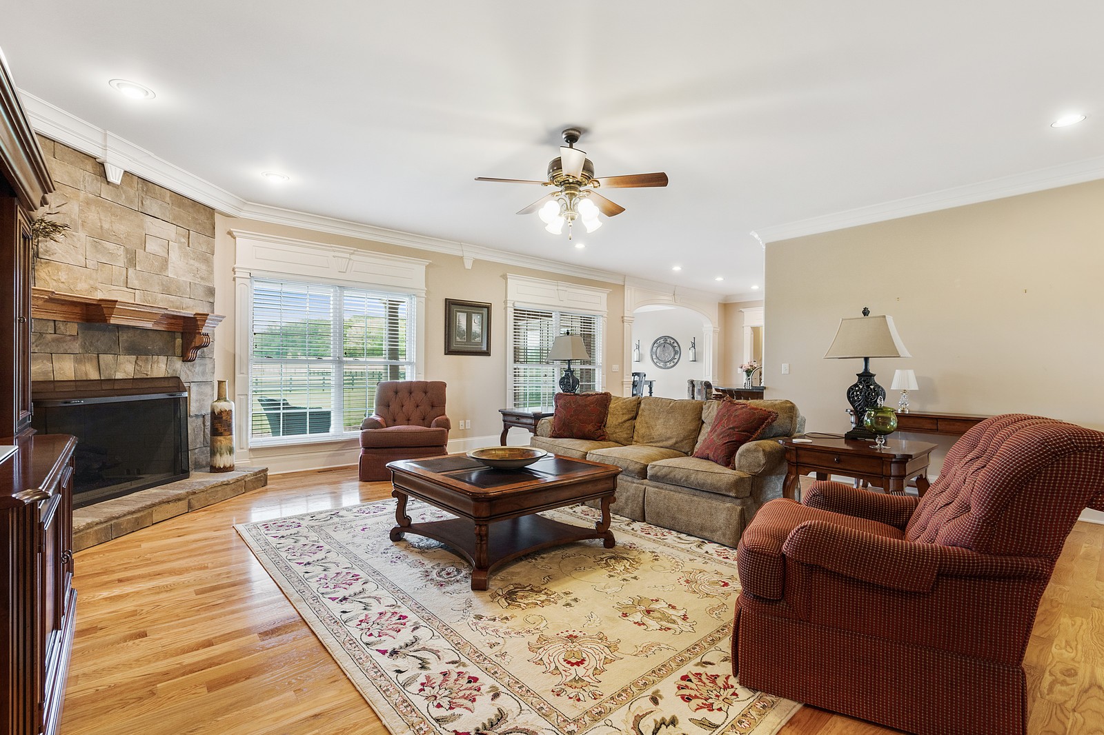 288 Lee Road Cottontown, TN 37048 - Photo 17 of 47 a living room with furniture a fireplace and a floor to ceiling window