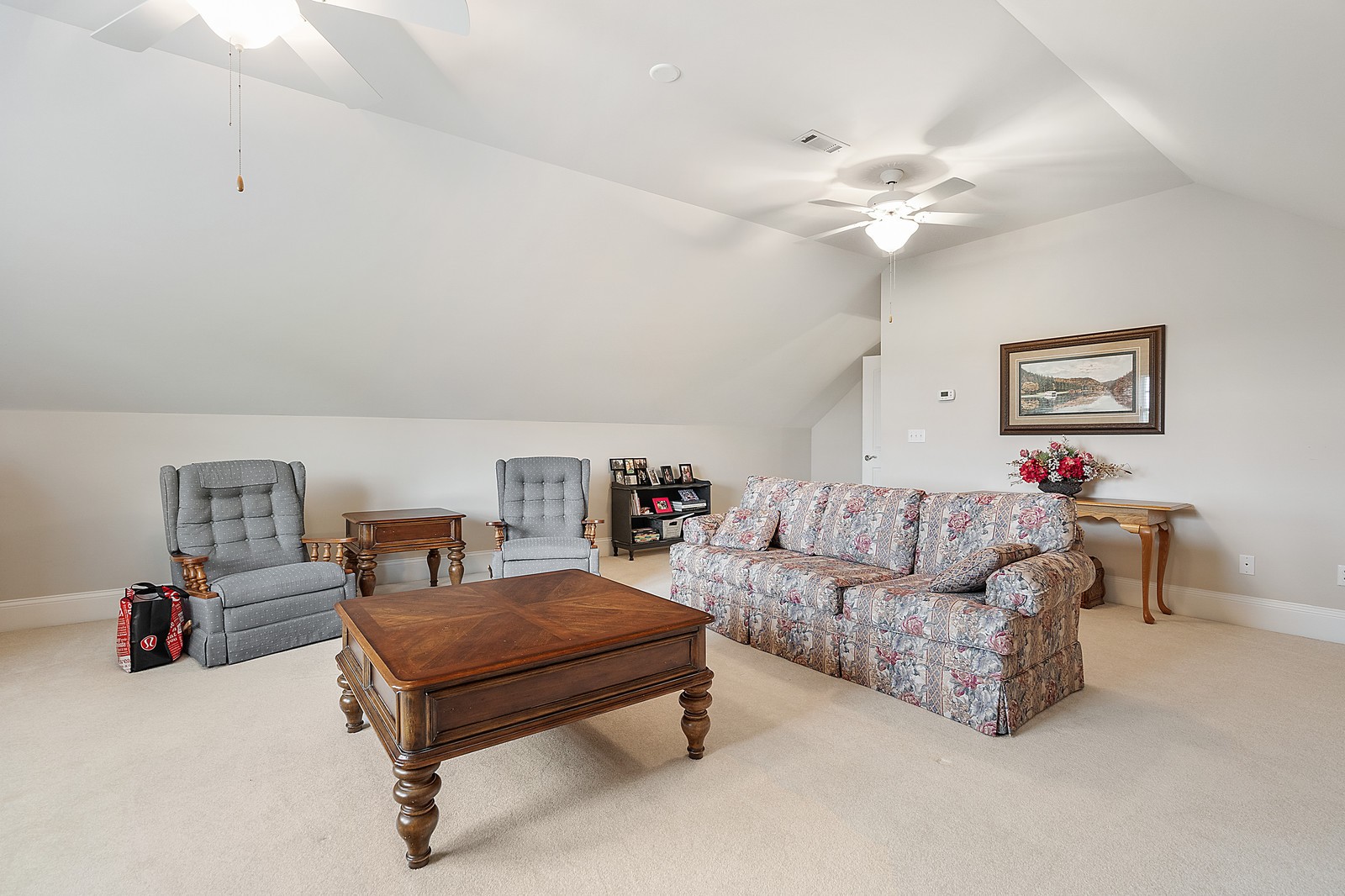 288 Lee Road Cottontown, TN 37048 - Photo 24 of 47 a living room with furniture and a chandelier