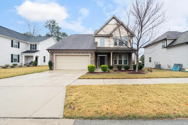 a front view of a house with a ocean view
