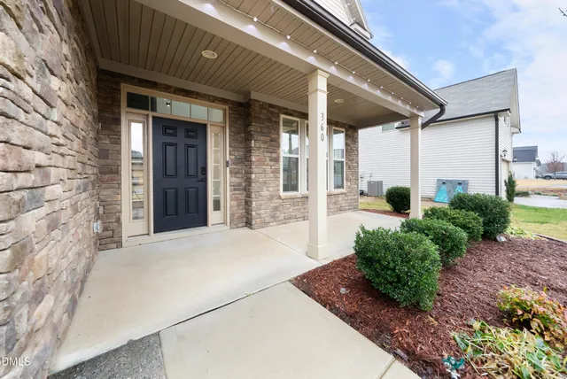 a view of a house with a porch