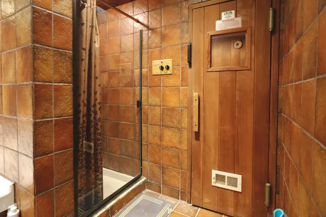 a view of balcony with furniture