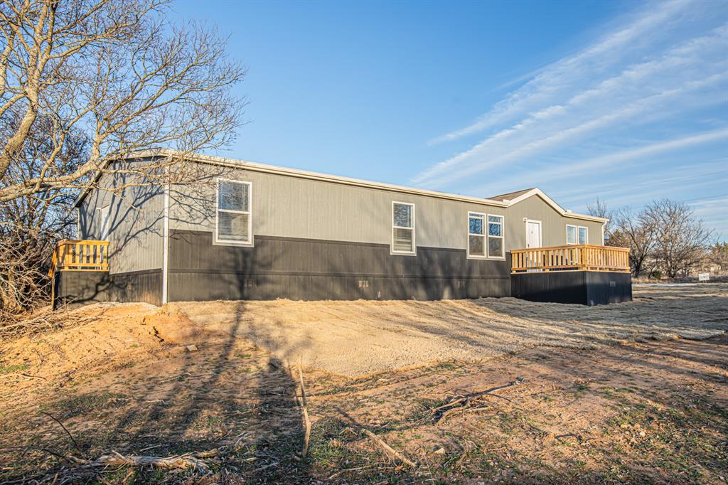 188 Valley Ridge Drive Jacksboro, TX 76458 - Photo 1 of 1 a front view of a house with a yard