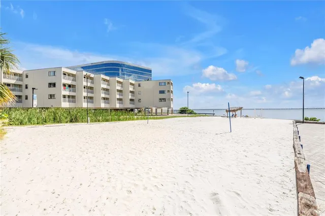 a view of a swimming pool with a lake view