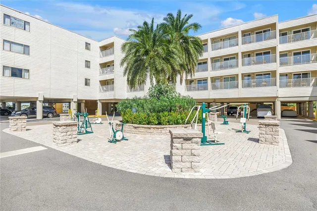 a swimming pool with outdoor seating and yard