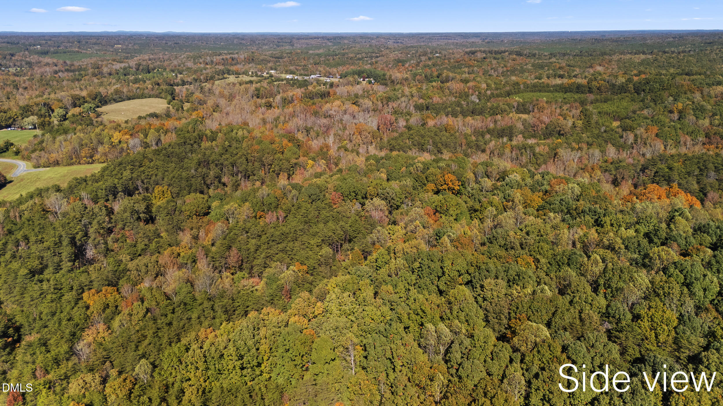 2400 Turner Road Reidsville, NC 27320 - Photo 2 of 4 a view of a city with lush green forest