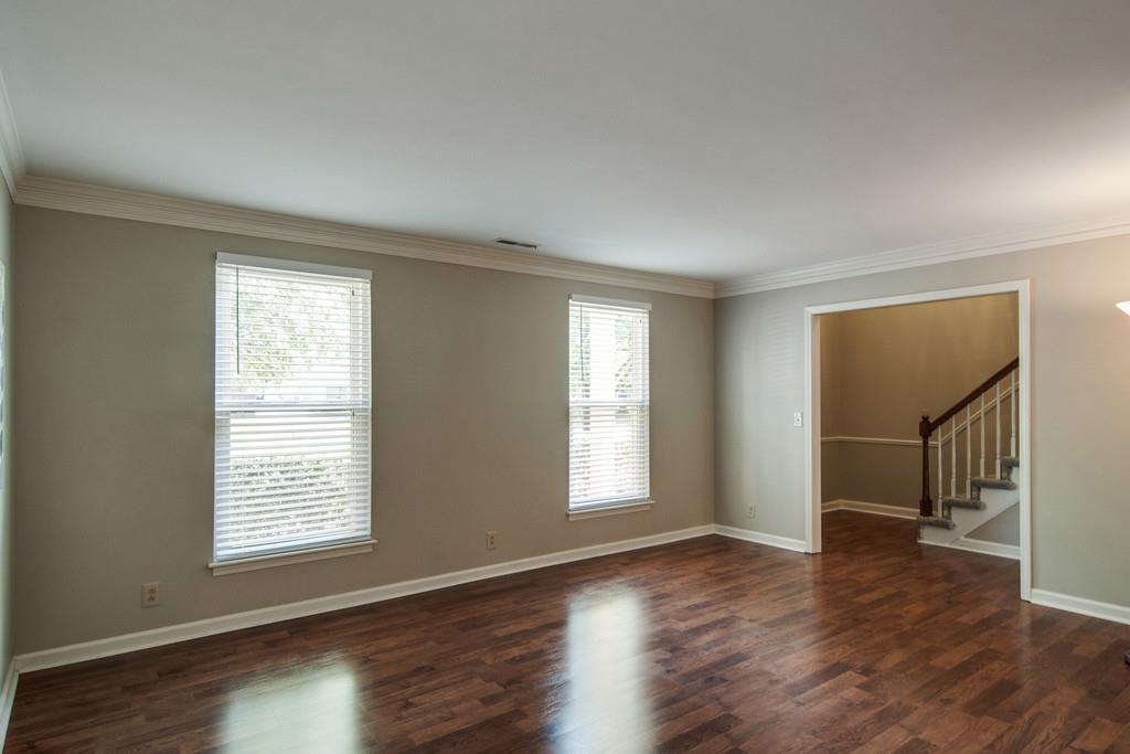 931 General George Patton Road Nashville, TN 37221 - Photo 5 of 22 a view of an empty room with wooden floor and a window