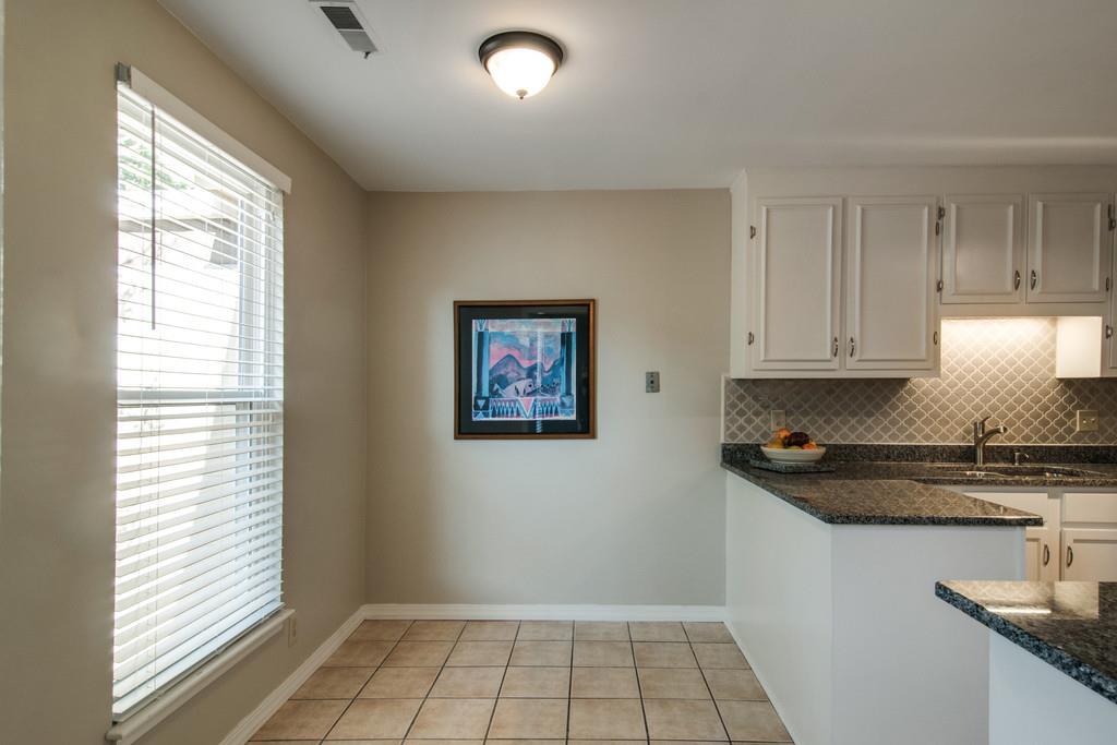 931 General George Patton Road Nashville, TN 37221 - Photo 9 of 22 a kitchen with a sink and cabinets