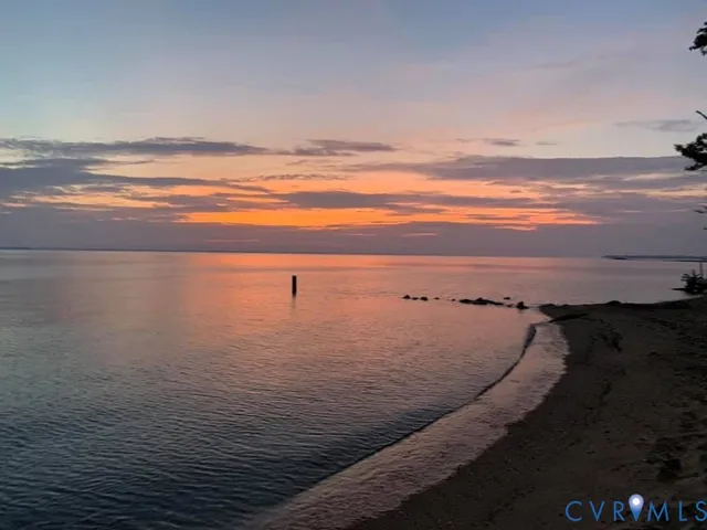 a view of a swimming pool with a yard