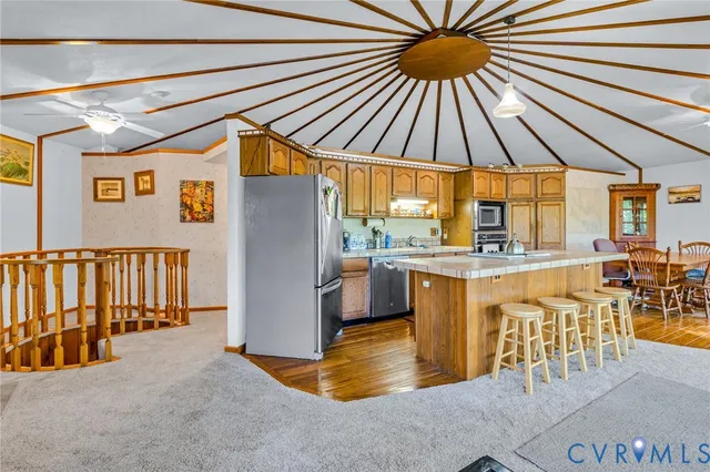 a dinning table and chairs in the patio