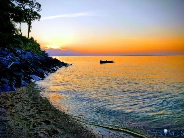 a bedroom with a bed and a lamp