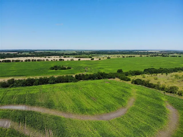 a view of a lake with a big yard