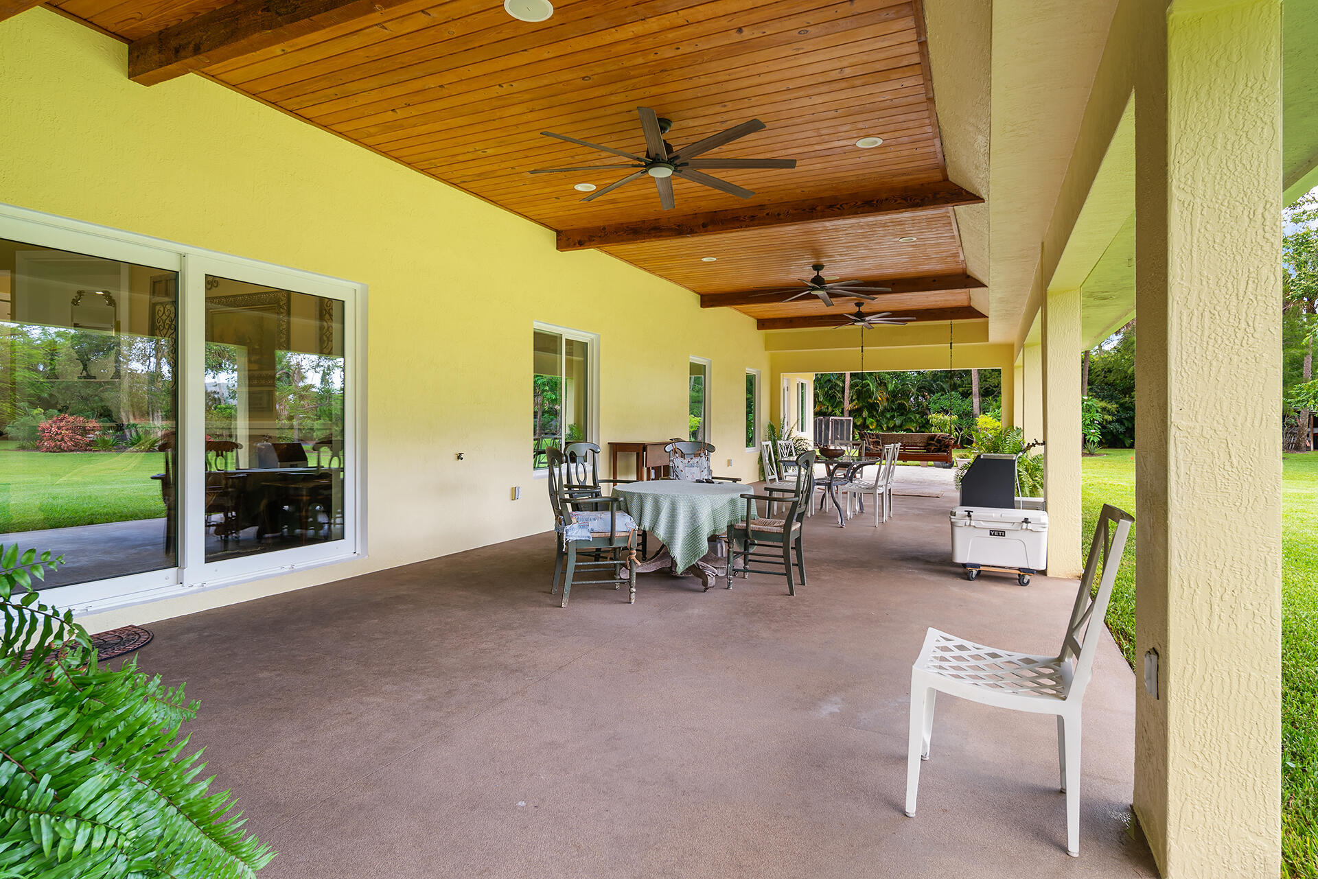 6624 Dillman Road Greenacres, FL 33413 - Photo 51 of 77 Lanai with custom wood beam ceiling
