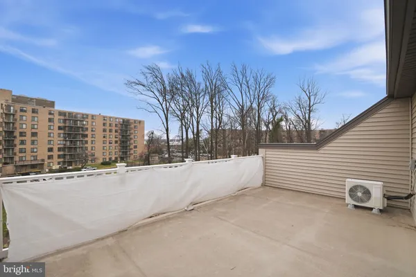 a view of terrace with yard