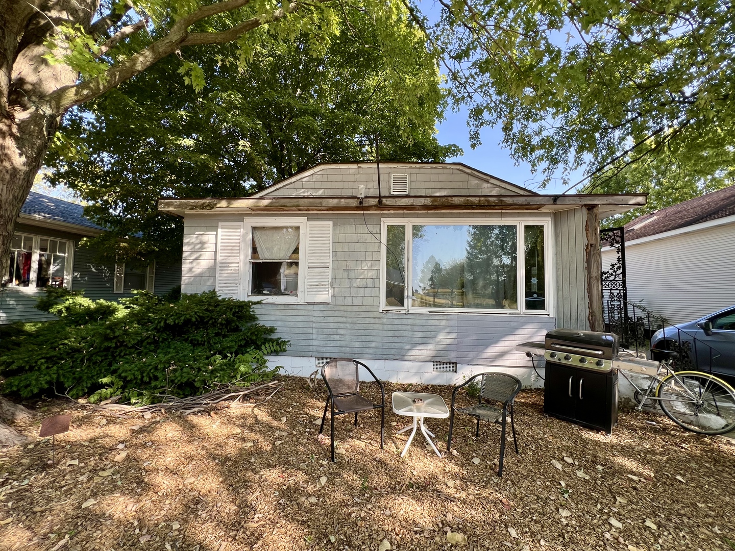 514 West Harrison Street Villa Grove, IL 61956 - Photo 1 of 21 a backyard of a house with seating space